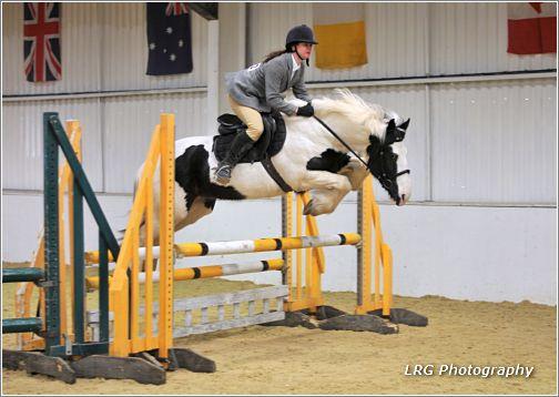 Annemarie showjumping with her horse