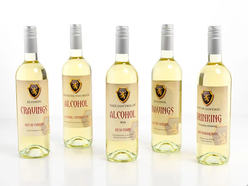 Five bottles of white wine labelled Cravings, Alcohol and Drinking in a row.