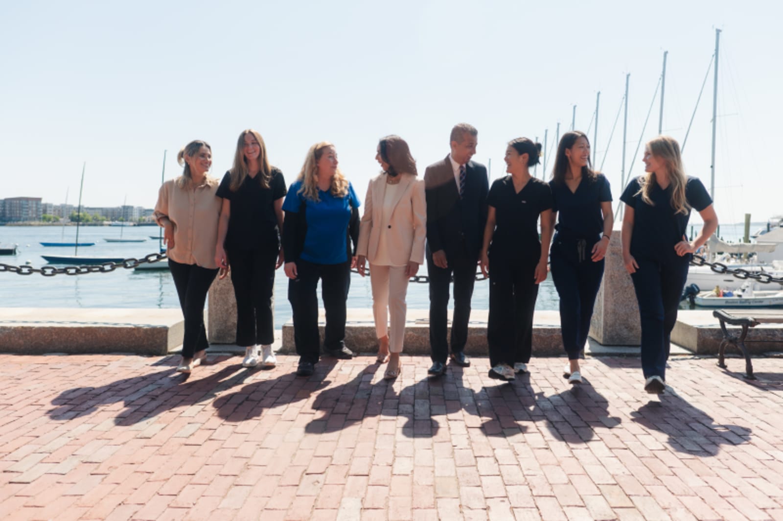 Lewis Wharf Dental team posing together at waterfront location