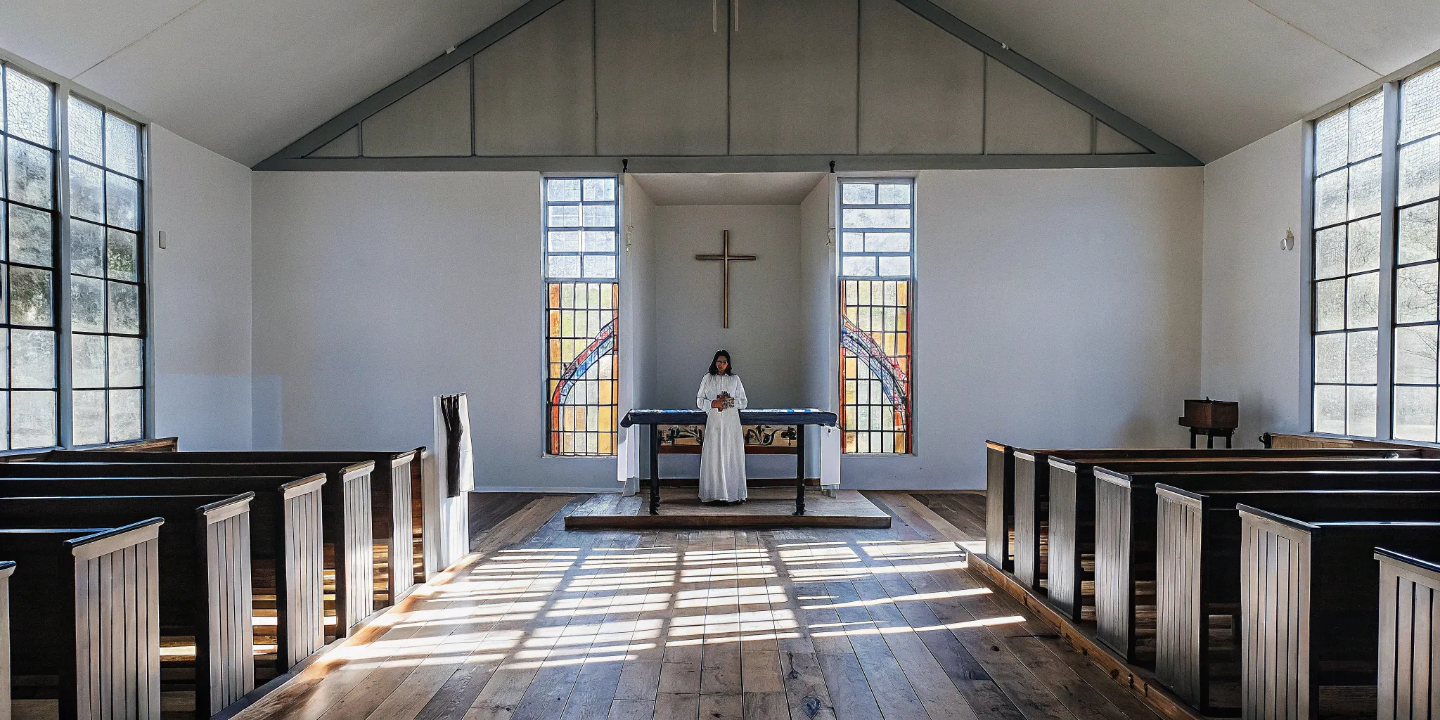A bride at the altar, a moment guided by a professional with wedding officiant training.