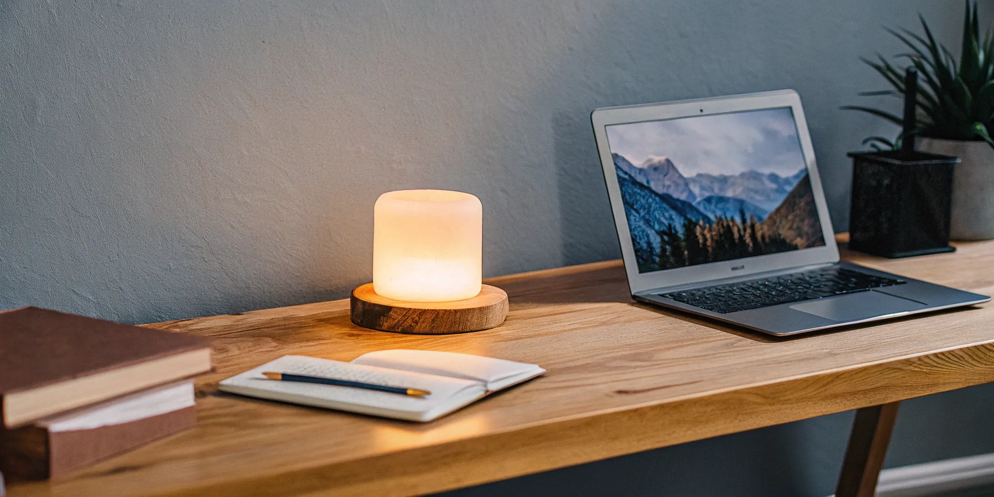 A desk with a laptop for finding an online officiant certification program.