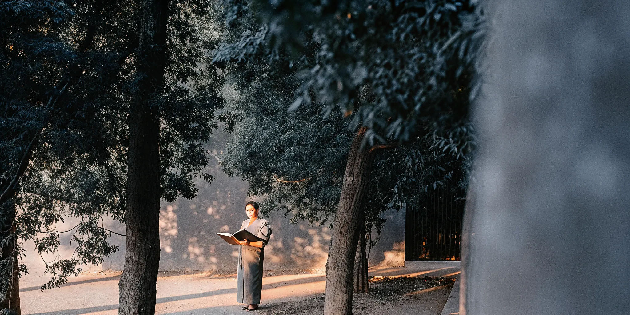 Ordained officiant holding a book, ready for the wedding ceremony.