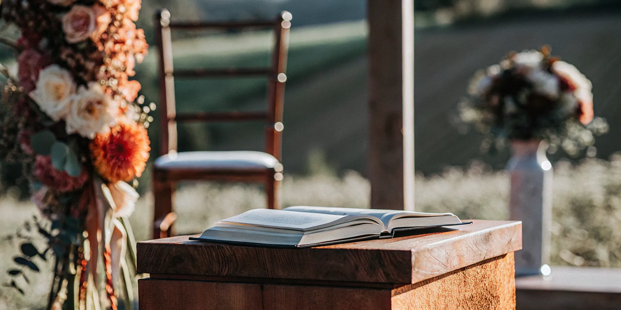 Wedding officiant license on table with flowers.
