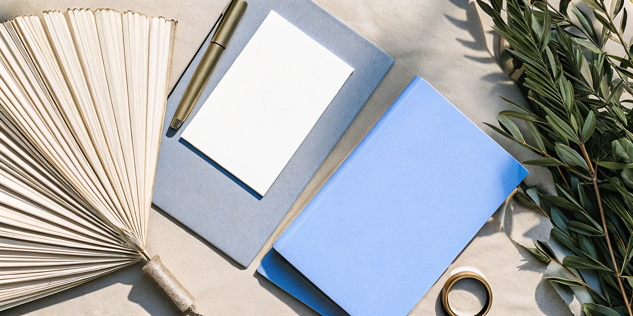 A notebook and pen for planning a secular wedding ceremony template.