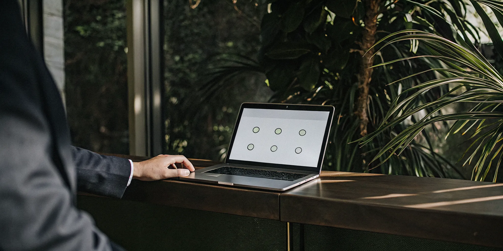 A person using a laptop to complete the online application to get ordained in Ohio.