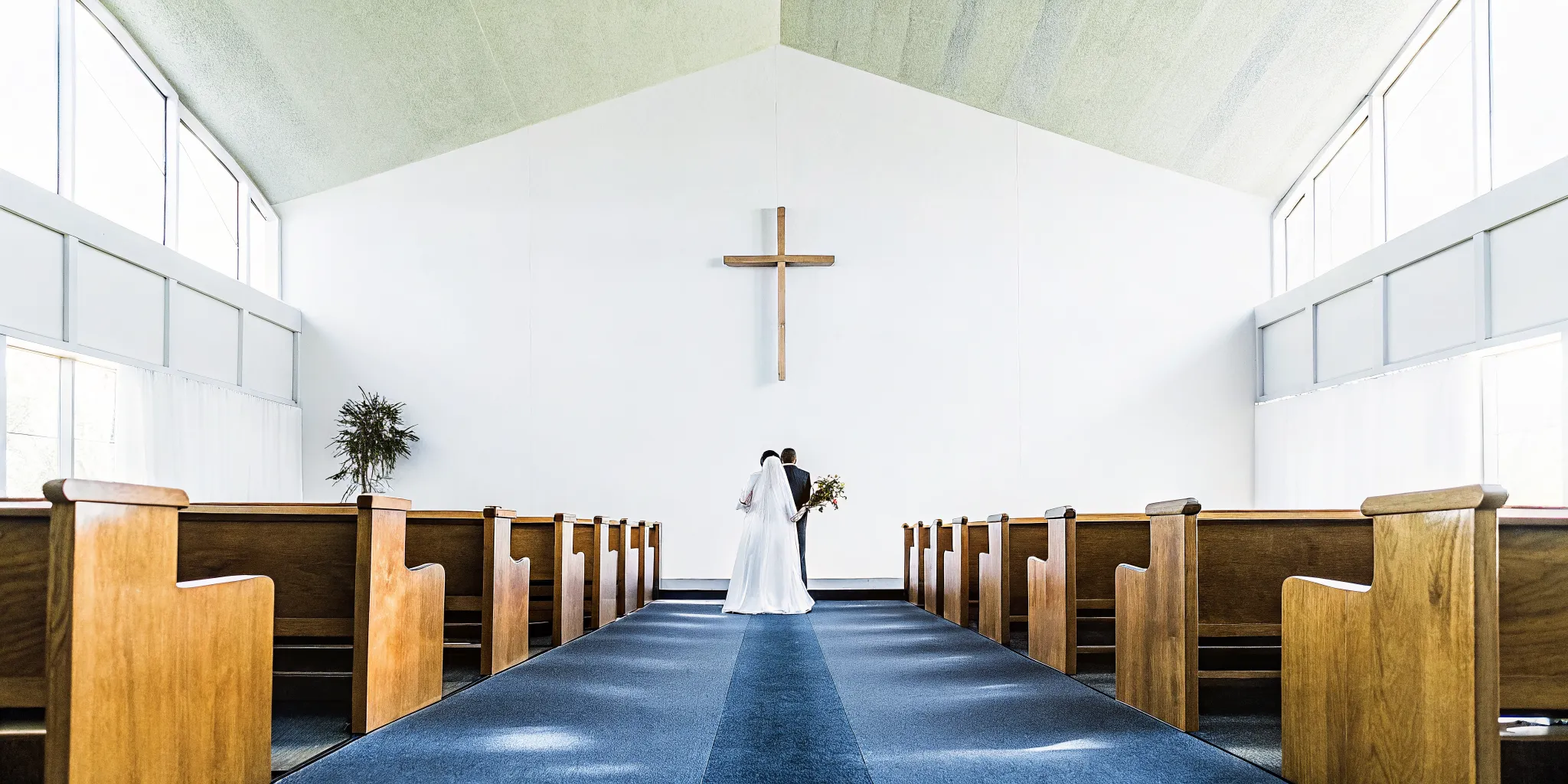 Bride and groom at the altar during a Southern Baptist wedding ceremony.
