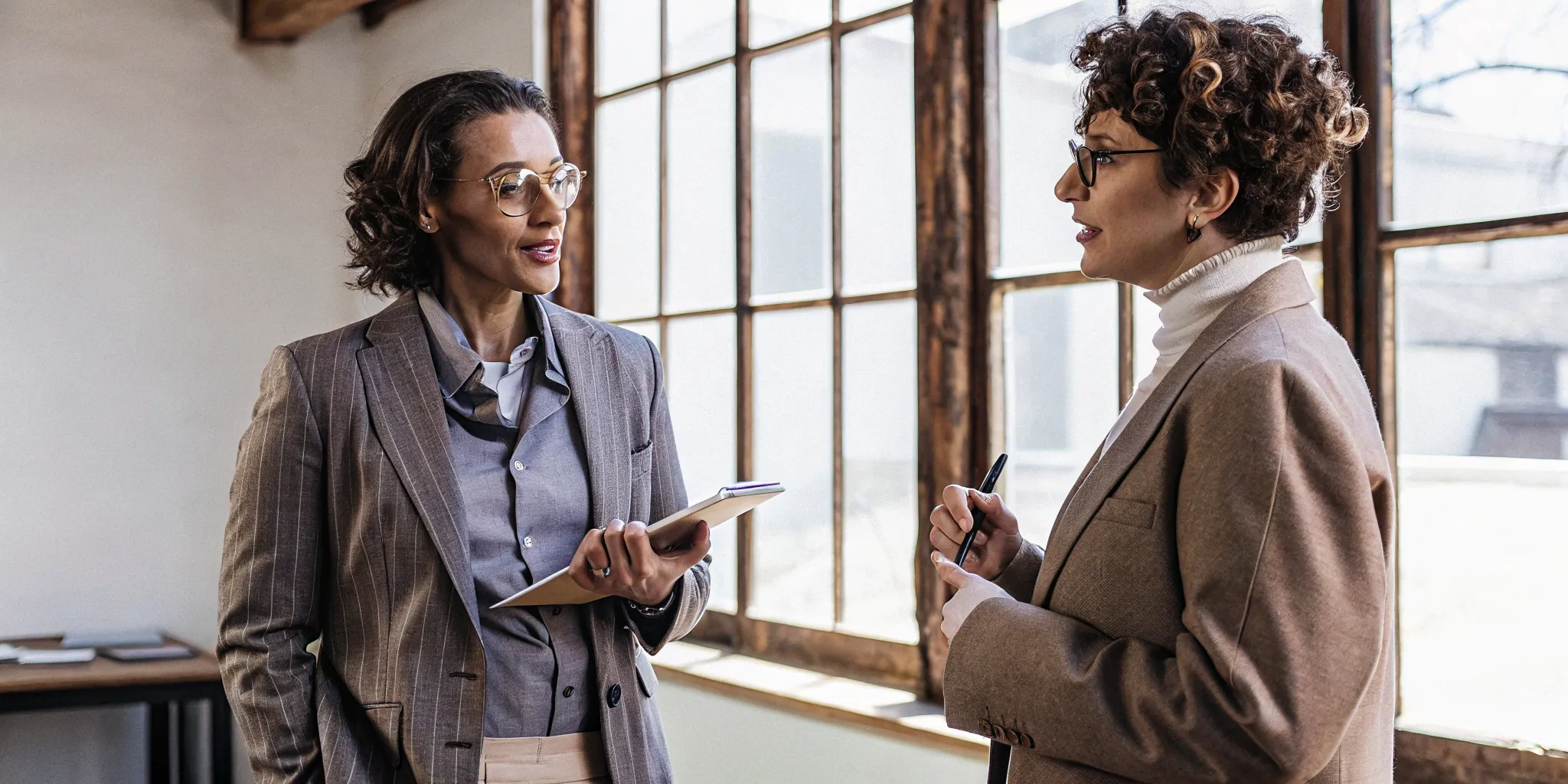 Two women in a professional officiant coaching and mentorship session.