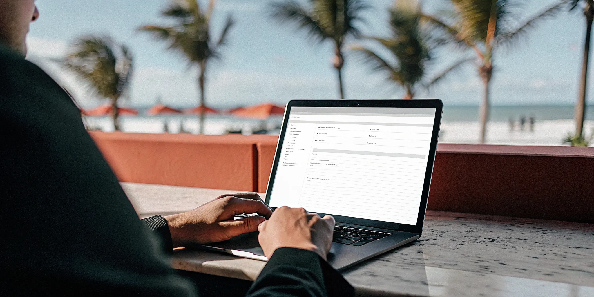 Person completing an online ordination application on a laptop with Miami skyline in background