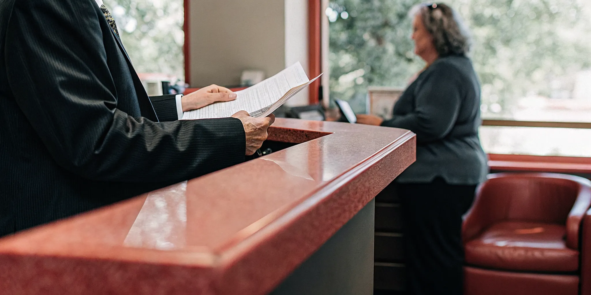 Newly ordained minister reviewing Hennepin County officiant filing paperwork