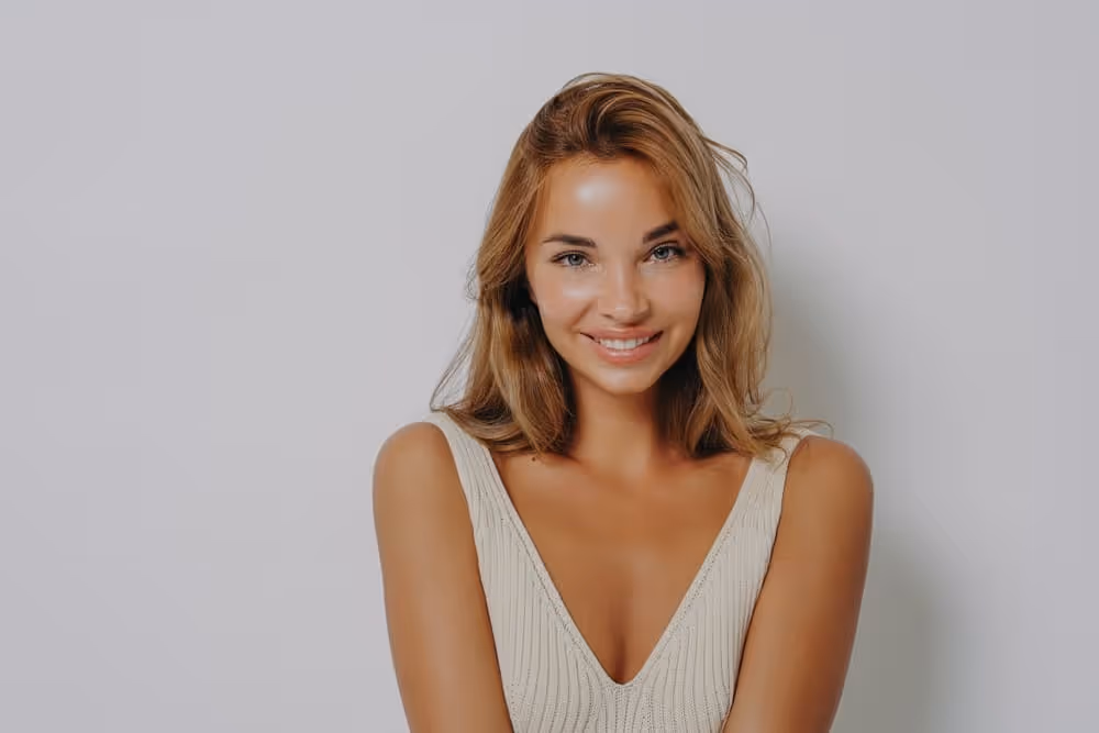 One-year breast lift recovery results showing natural shape and healed surgical outcome