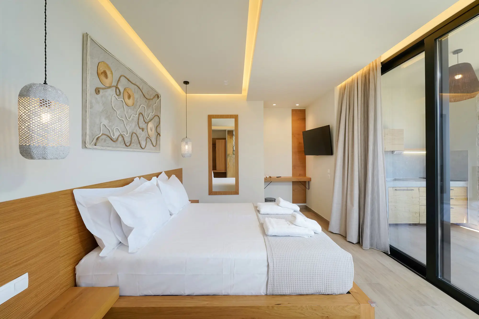 King bedroom with COCO-MAT bed, wall art and sea-view balcony | Bedroom