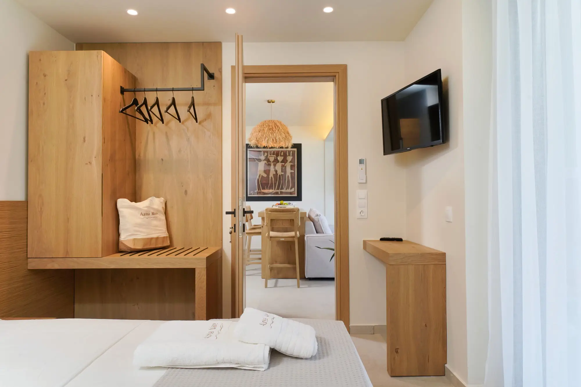 King bedroom with COCO-MAT mattress, ribbed oak headboard and built-in storage | Bedroom