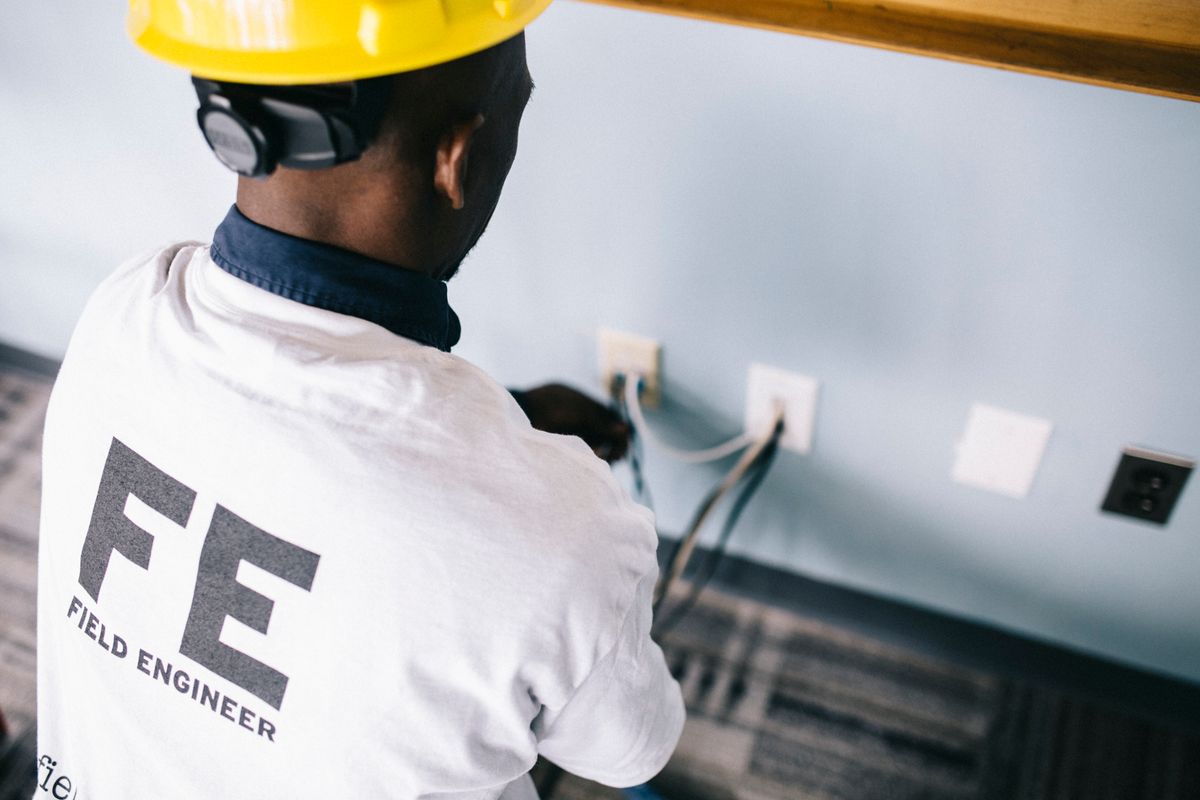 Plumber working on residential system