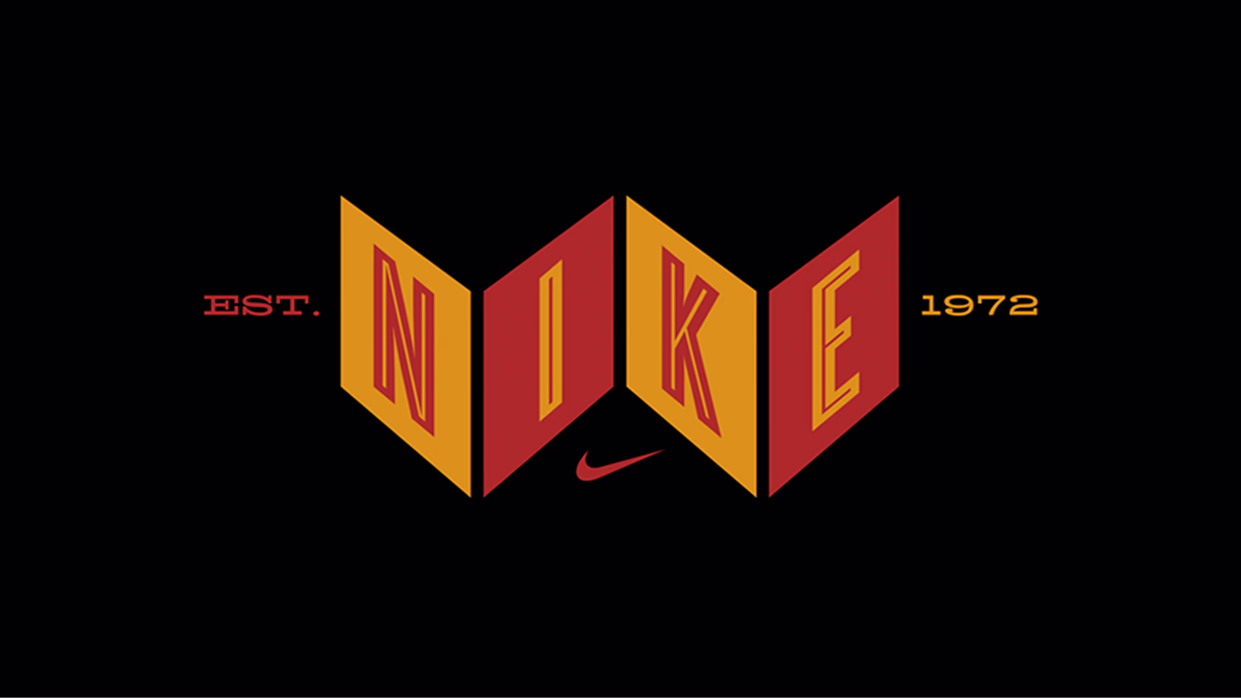 Red and yellow vintage Nike 1972 logo on black