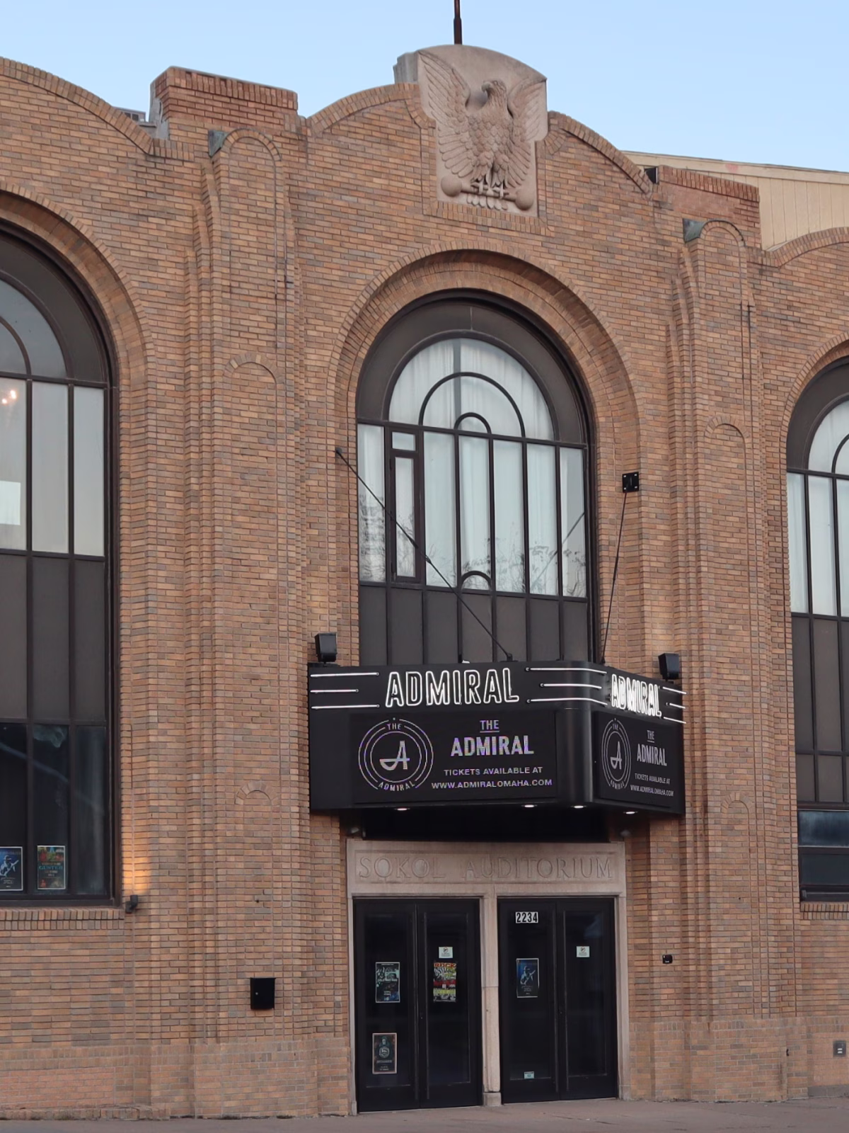 Brick entrance facade of The Admiral music venue in Omaha