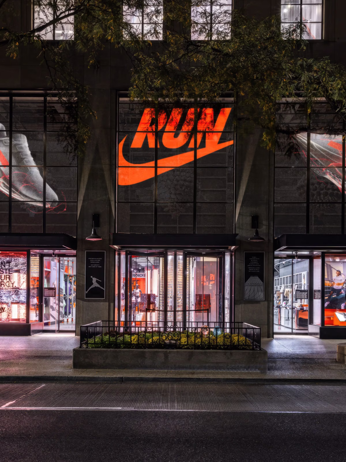 Nike Chicago storefront on Michigan Avenue at night