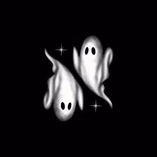 Two soft white ghosts floating against black