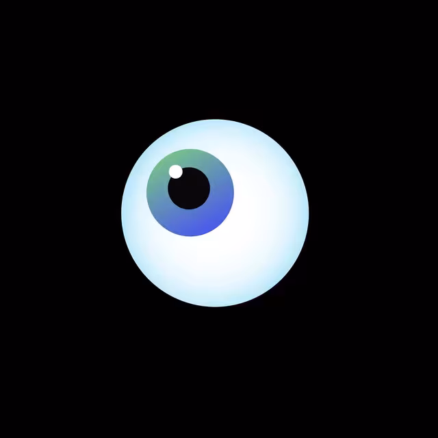 Glowing blue-green eyeball centered on black