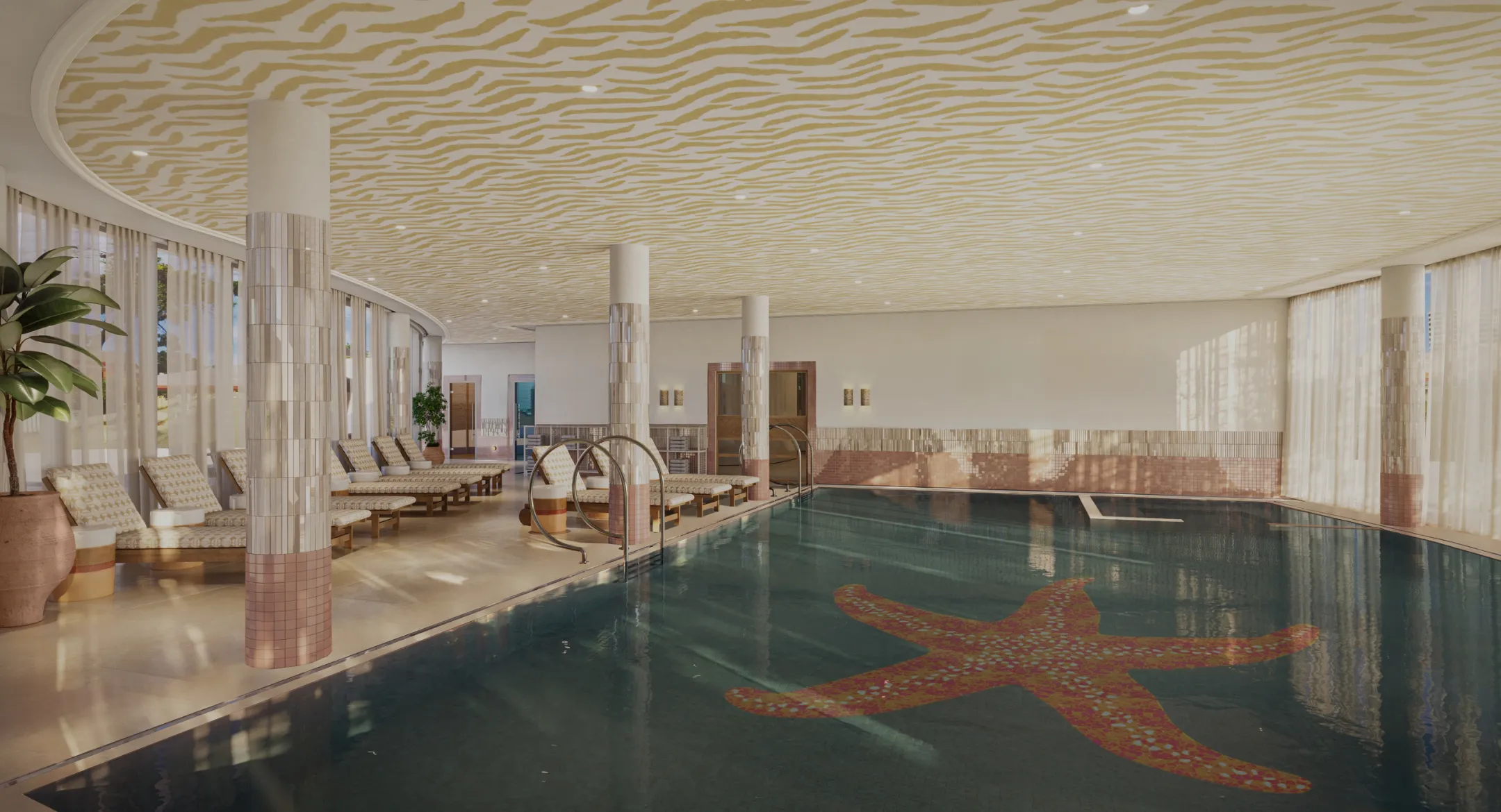 Piscine intérieure avec un grand motif étoile de mer au fond et chaises longues décorées sur le côté.