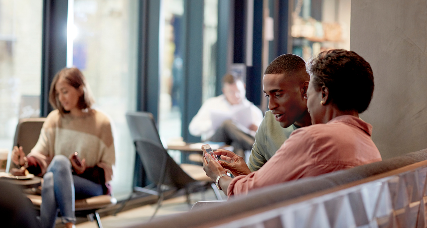 Two customers enjoying Starbucks