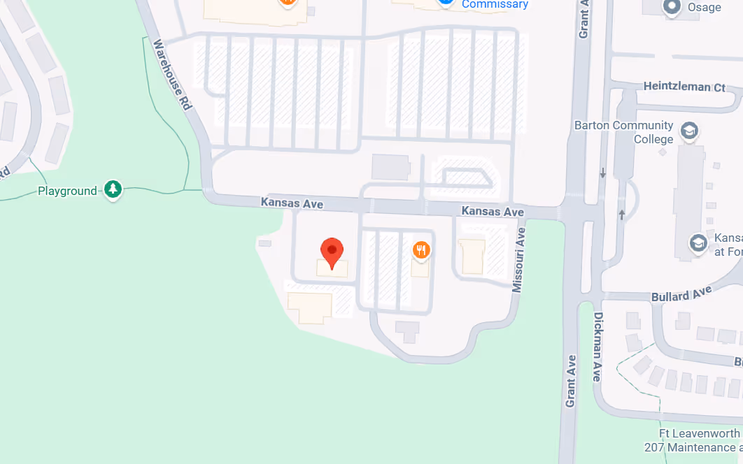 Map showing Kansas Ave and nearby streets including Warehouse Rd, Missouri Ave, and Grant Ave near Barton Community College and a playground.