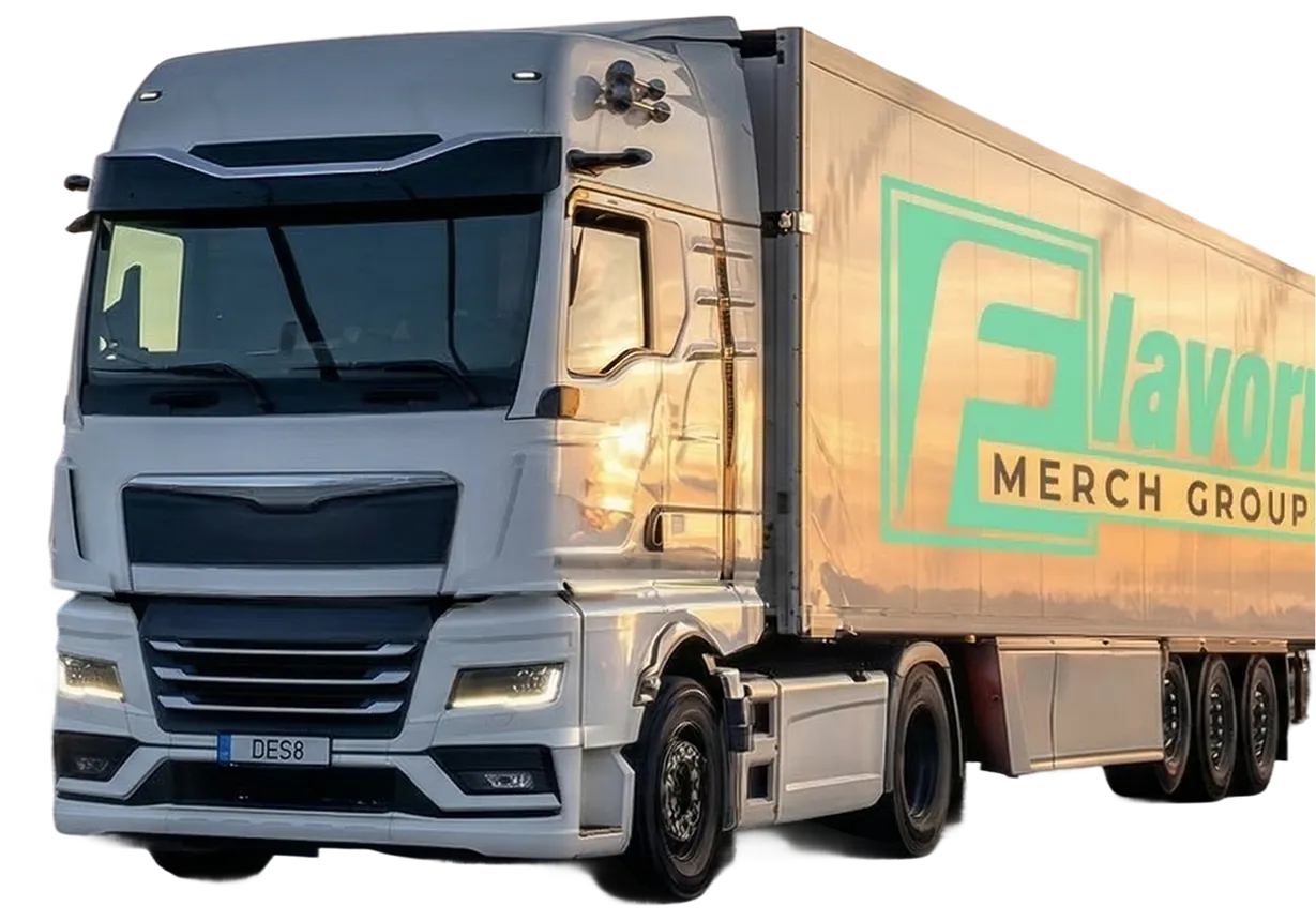 White semi-truck with trailer displaying 'Favor Merch Group' logo on the side.