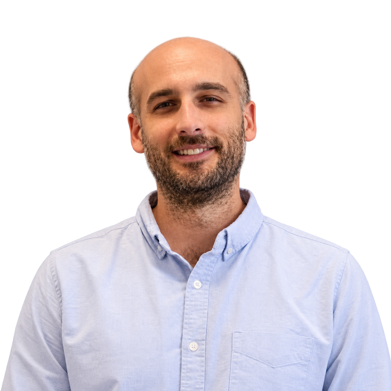 Martin Patrone smiling in a light blue shirt