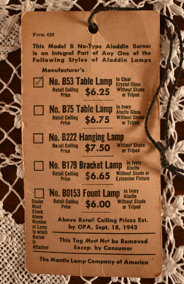 Vintage lamp price tag listing Model B Nu-Type Aladdin burners and prices from 1943, with one checked box.