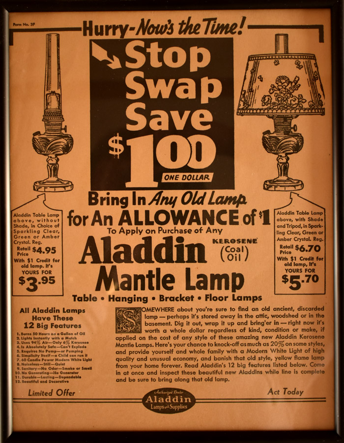 Vintage ad urging to stop, swap, and save $1 on Aladdin mantle lamps with any old lamp trade-in.