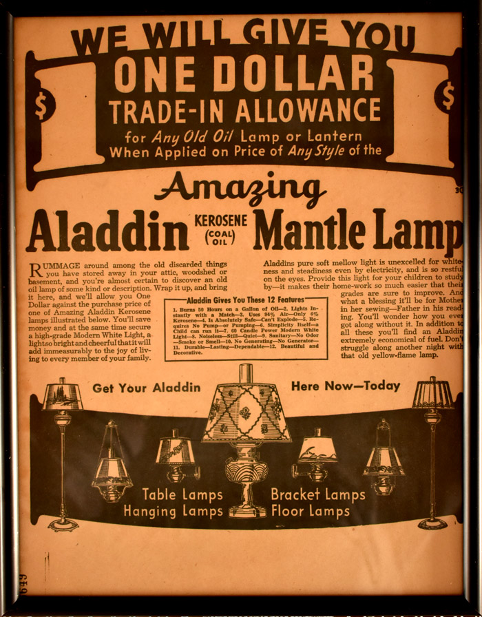 Vintage ad offering one dollar trade-in for old oil lamps on Aladdin Kerosene Mantle Lamps with lamp illustrations.