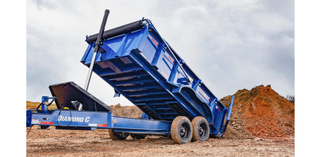 Yellow Bandit 18XP wood chipper trailer with single wheel and chute for wood branches.