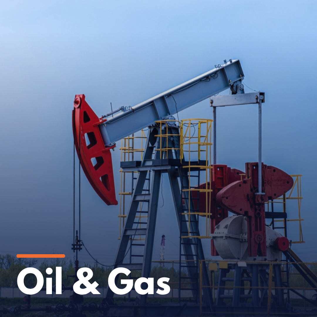 Oil pumpjack with red and gray parts set against a blue sky, labeled 'Oil & Gas'.