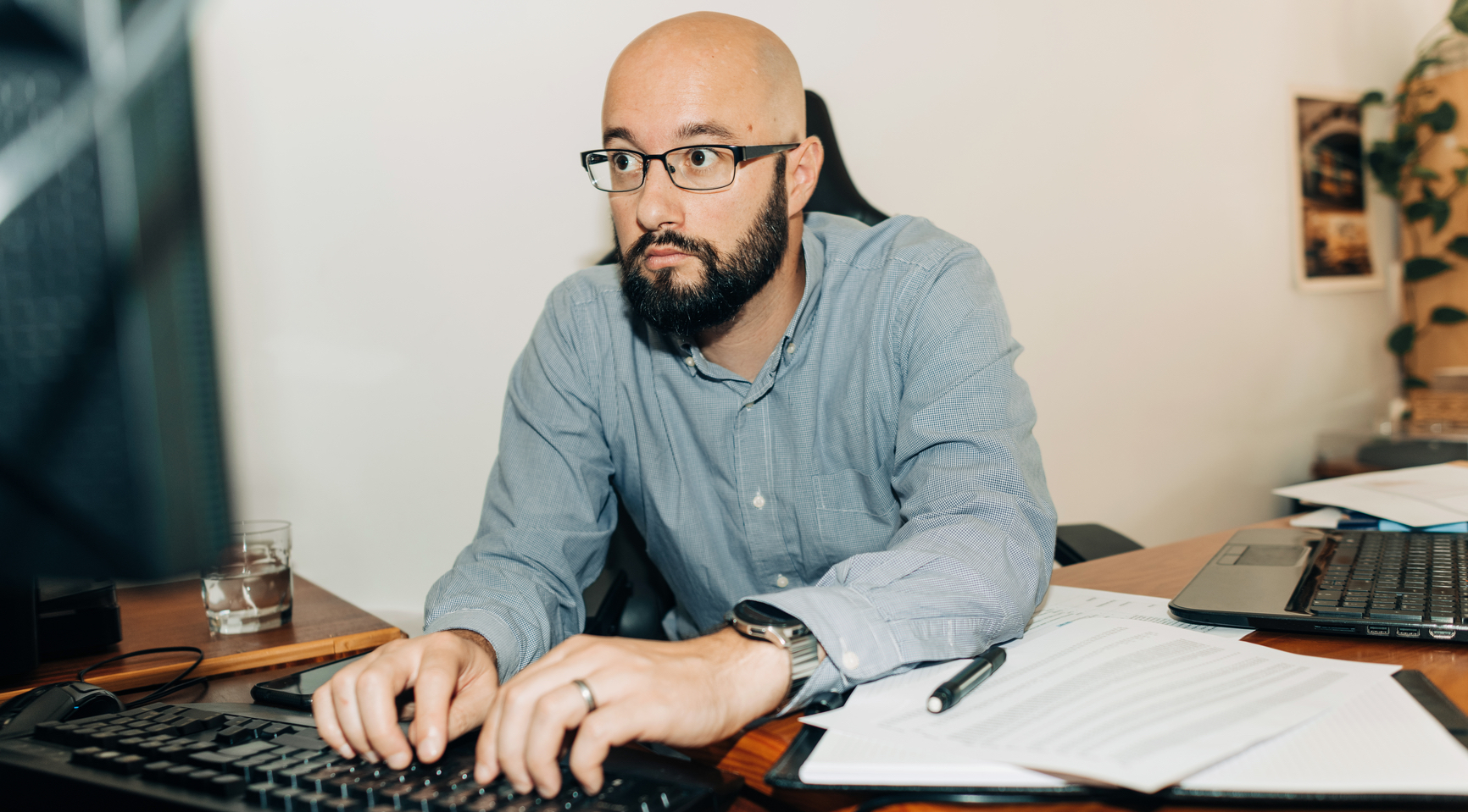 Lawyer typing at his computer