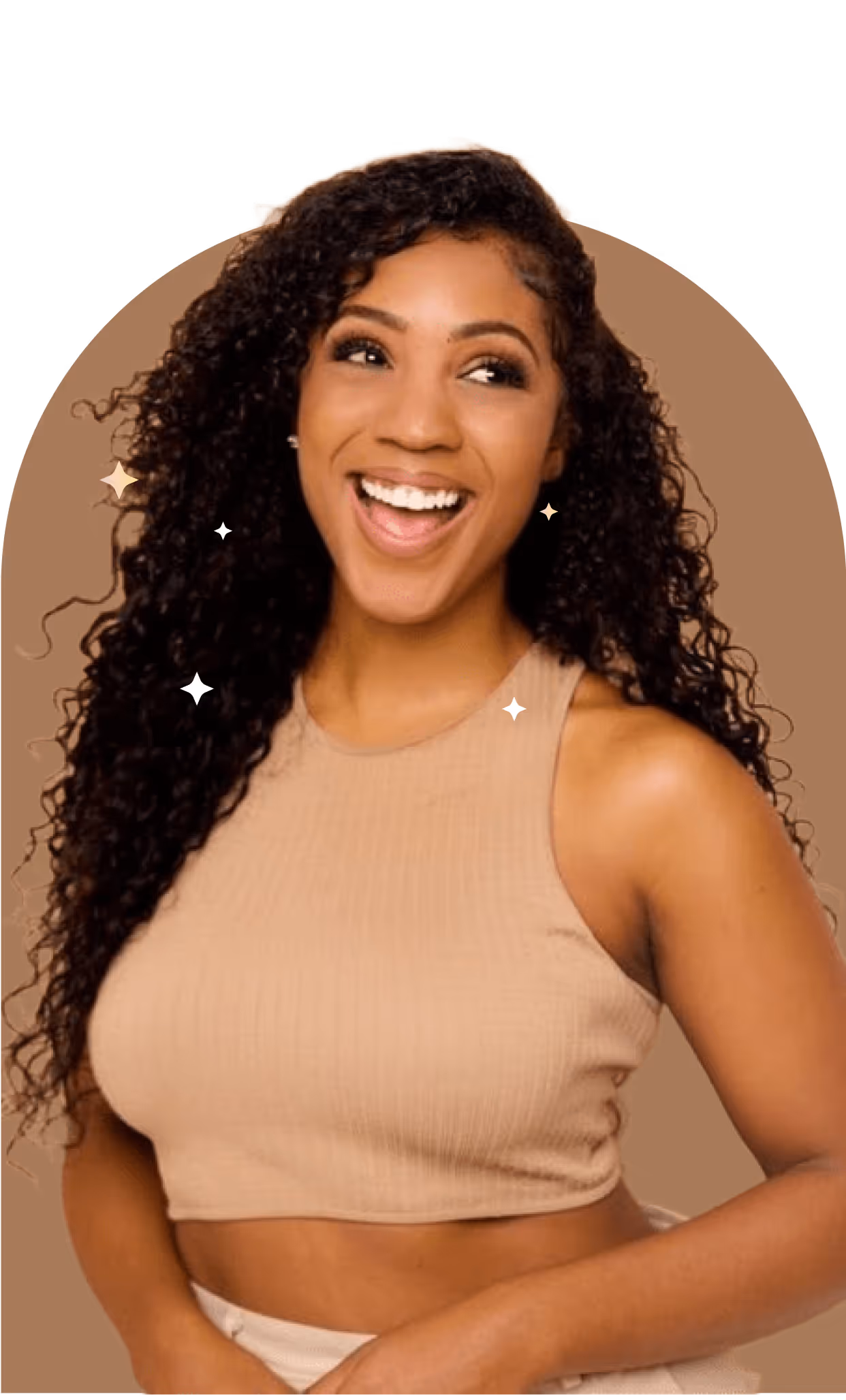 Smiling woman with long, curly hair, wearing a beige ribbed crop top, with subtle sparkle effects around her. 