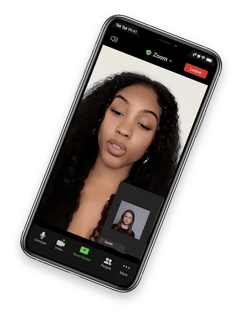 Smartphone screen showing an active video conference call with a woman as the primary speaker and another participant's thumbnail.