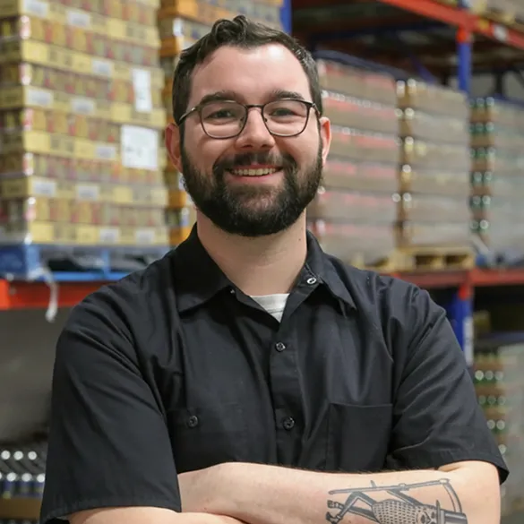 CartonColoud’s logistics worker from Drink Distribution standing in warehouse storage area