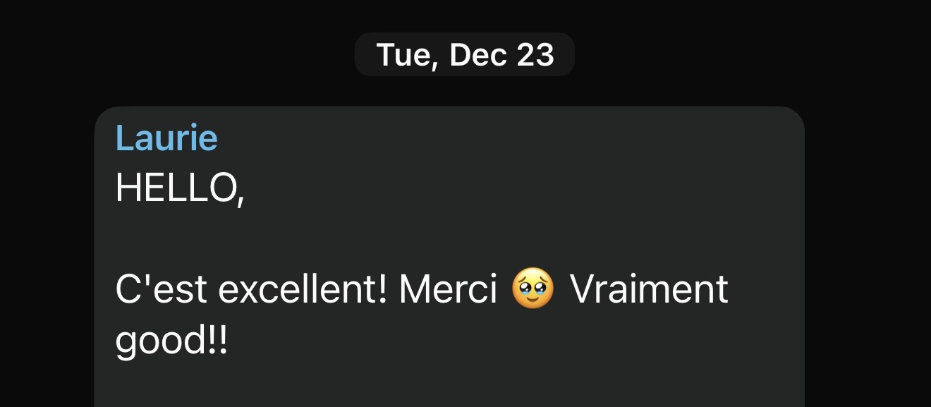 Text message from Laurie on Tuesday, Dec 23 saying: HELLO, C'est excellent! Merci with a teary-eyed emoji Vraiment good!!