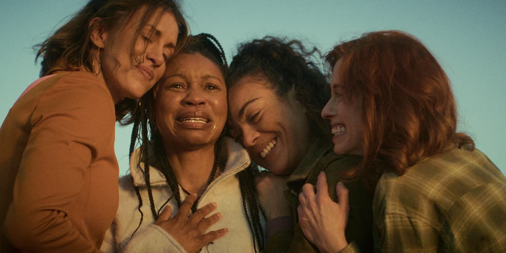 Cassidy Kendra Loiza Eleanor Embracing — Lady Kings of Texas production still