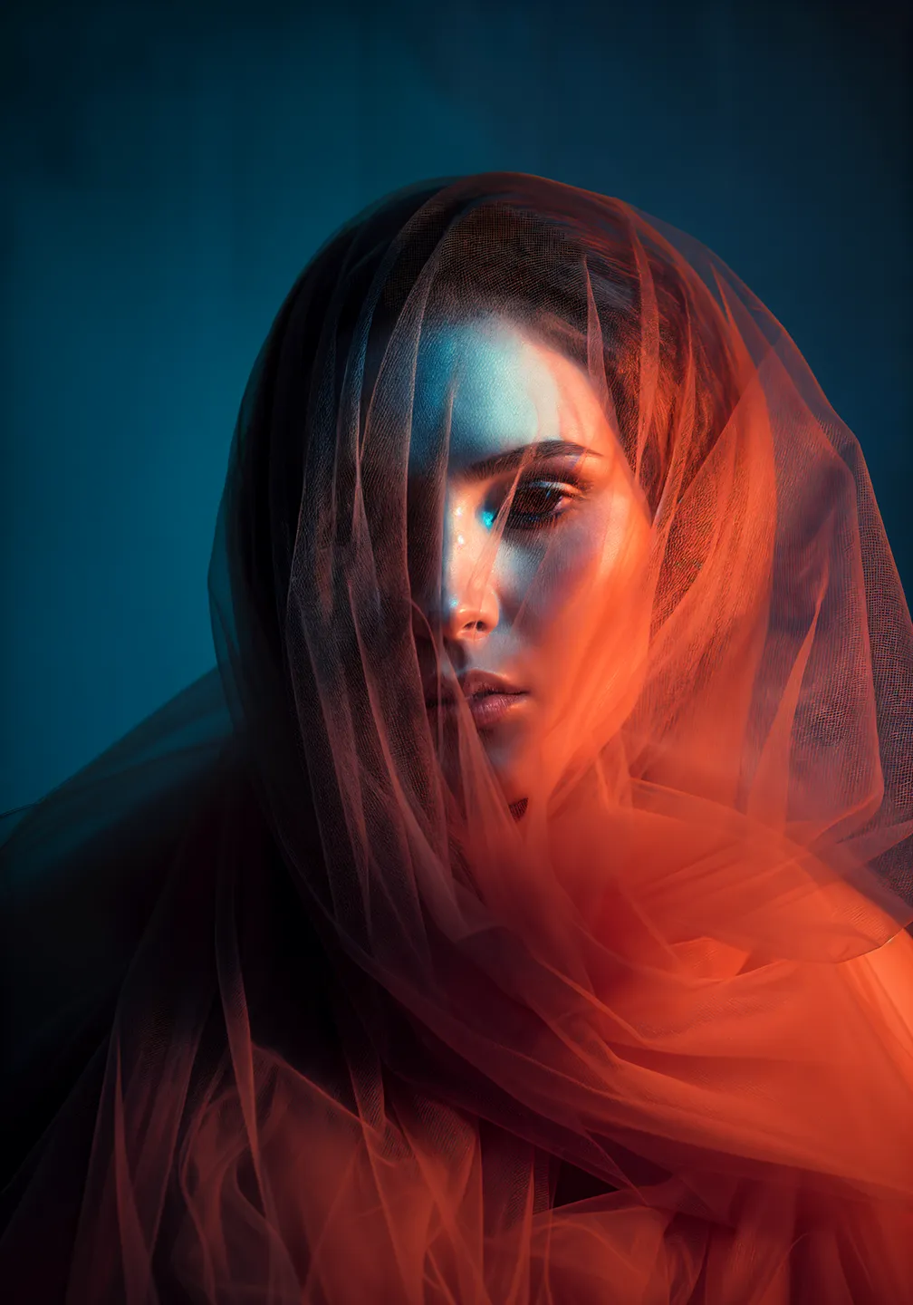 woman covered in red silk