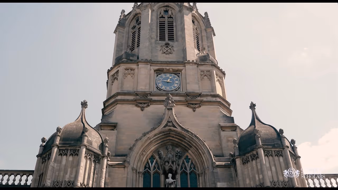 Close-up view of a historic stone clock tower with gothic architectural details.
