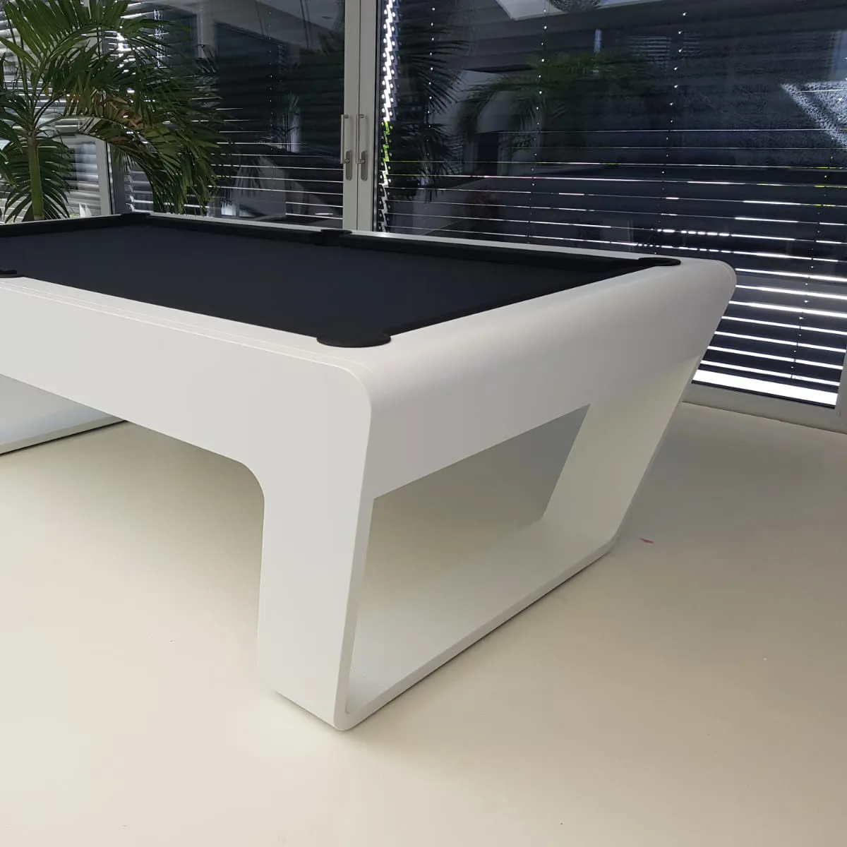 luxury pool table 247 in white with black cloth in modern house 