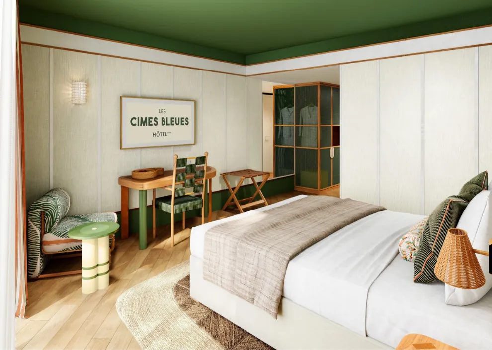 Design chic aux Cimes Bleues : touches de vert, rotin et lit king-size pour vos chambres et suites d'hôtel au bord de mer et hôtel spa.