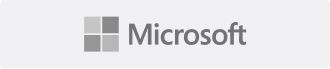 Microsoft company logo with four square panes forming a larger square and the word Microsoft in a modern font.