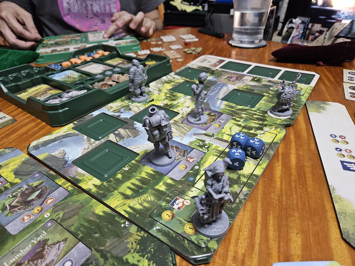 Gameplay photo of the board game Mythwind featuring various components and board state.