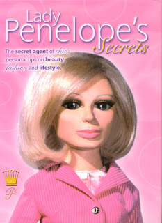 Image for the article: Lady Penelope's Lifestyle Secrets Review - Bookshelf