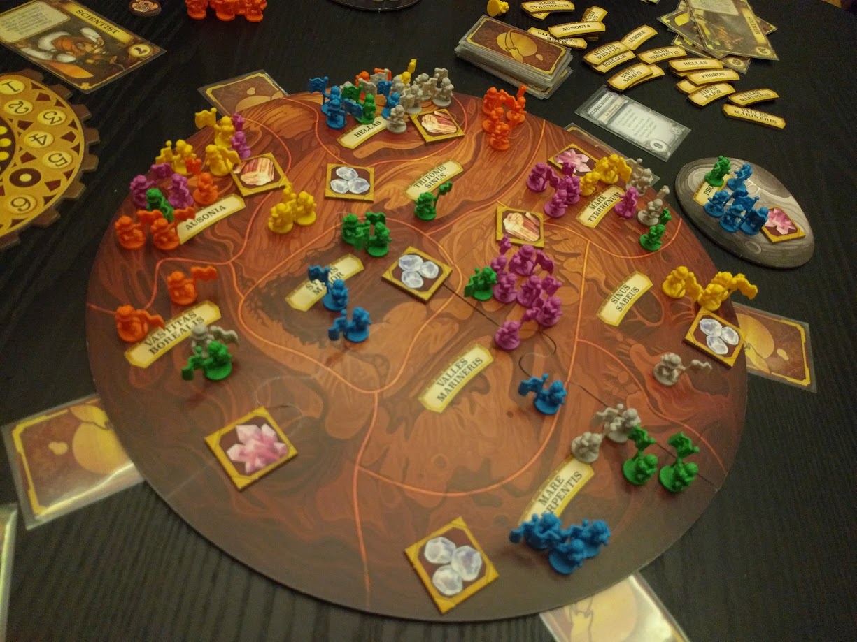 Gameplay photo of the board game Mission: Red Planet featuring various components and board state.