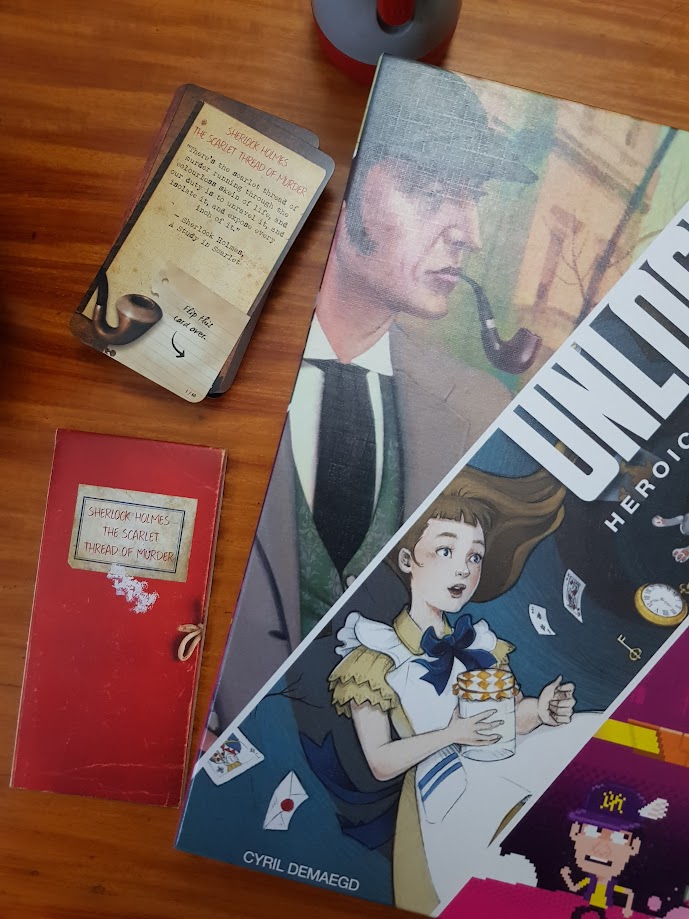 Gameplay photo of the board game Unlock!: Heroic Adventures featuring various components and board state.