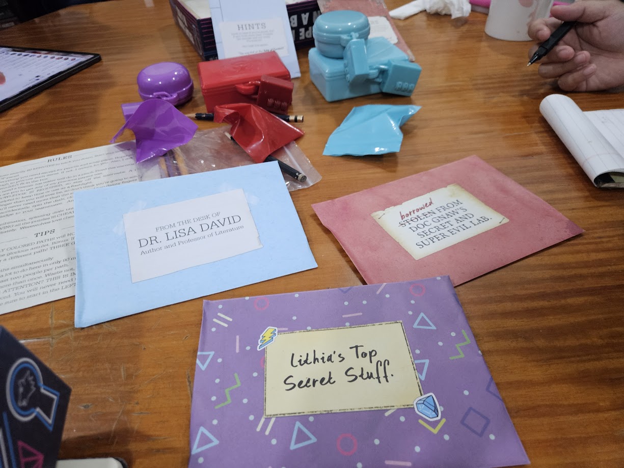 Gameplay photo of the board game Escape Room in a Box: Flashback featuring various components and board state.