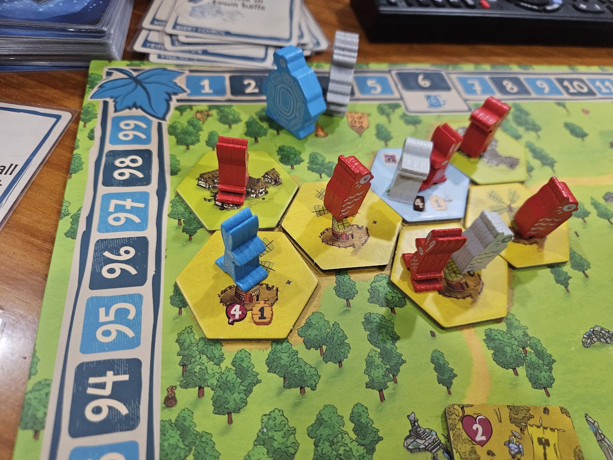 Gameplay photo of the board game Emberleaf featuring various components and board state.