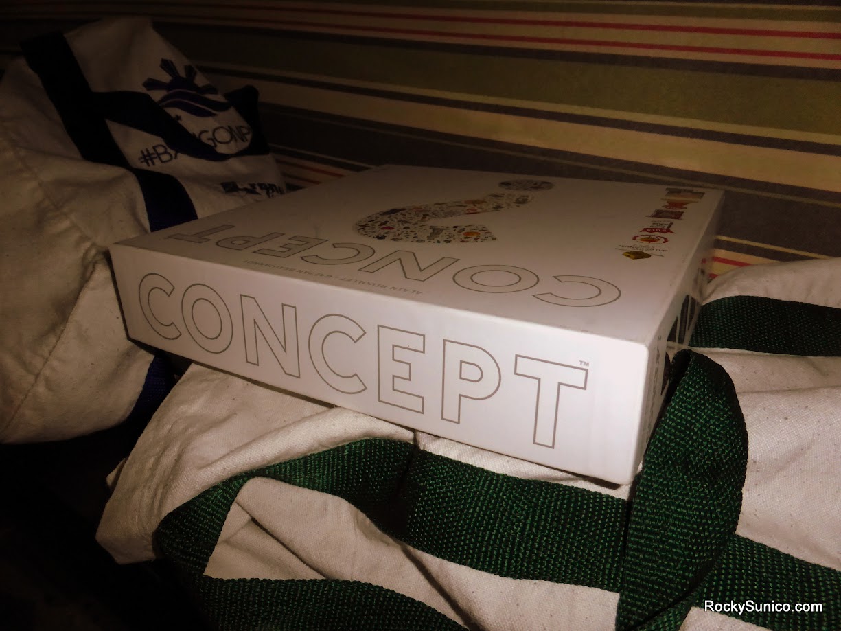 Gameplay photo of the board game Concept featuring various components and board state.